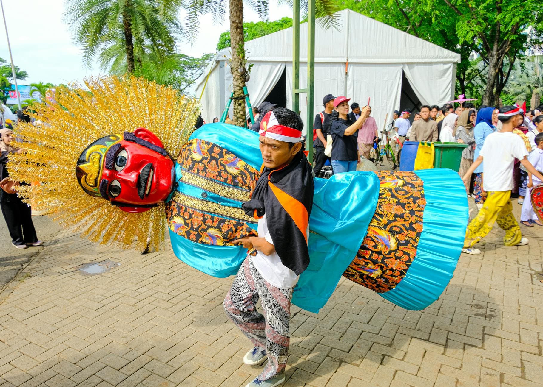 Cultural celebration with Ondel-Ondel figures in Jakarta, Indonesia.
