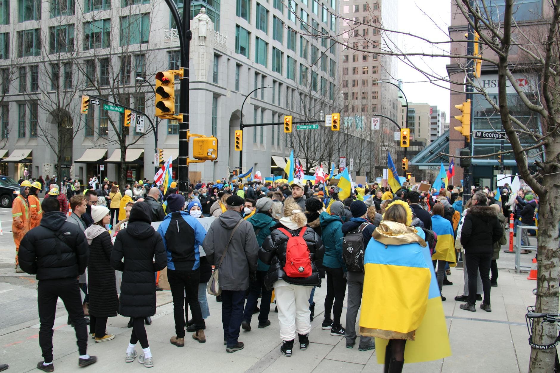 Crowd gathers in downtown Vancouver for a protest supporting Ukraine.